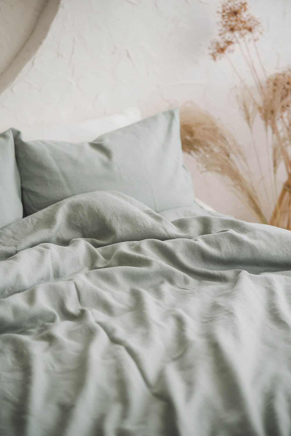 Frostig grüner Leinen-Bettbezug mit Knöpfen